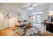 Light and airy living room with access to patio at 955 Juniper Ne St # 4027, Atlanta, GA 30309