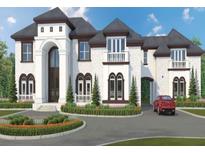 Grand two-story house with a circular driveway at 1811 Trinidad, Stockbridge, GA 30281