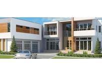 Modern house exterior with attached garage at 1711 Grand Cayman, Stockbridge, GA 30281