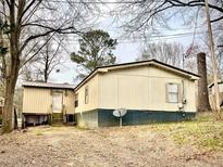 Single-wide manufactured home with yard at 2646 Lakeshore Ne Dr, Conyers, GA 30012