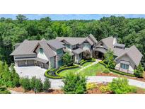 Luxury home with large backyard and circular driveway at 962 Chattooga Trce, Suwanee, GA 30024