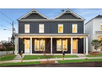 Two new townhouses with front porches and modern design at 597 Federal Se Ter, Atlanta, GA 30315