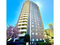 High rise building with brick exterior and balconies at 1501 Clairmont Rd # 1917, Decatur, GA 30033
