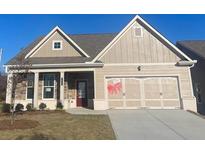 New two-story home with stone accents and a two-car garage at 2404 Anhinga Dr, Loganville, GA 30052