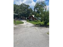 Long driveway leading to barn and other outbuildings at 3749 Centerville Rosebud Rd, Snellville, GA 30039
