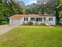 Charming single story home with a spacious yard and attached garage at 2122 Belhaven Se Ln, Atlanta, GA 30315