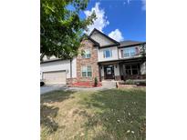 Two-story house with stone and siding exterior at 190 Thrushwood Dr, Fayetteville, GA 30215