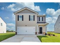 Two story house with two car garage at 12000 Conrad, Hampton, GA 30228