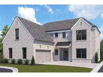 Stunning two-story home with brick facade and a three-car garage at 102 Cottage Gate Ln, Roswell, GA 30076