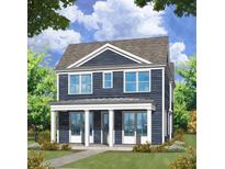 Two-story blue house with porch at 19 Hydrangea Unit 71 Way, Auburn, GA 30011
