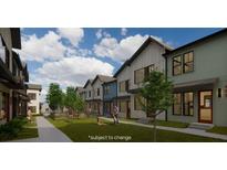 Exterior view of townhouses with a shared courtyard and green space at 1070 Dill Sw Ave, Atlanta, GA 30310