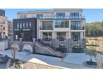 Modern commercial building with a nail lounge on the ground floor at 8200 Main S St # 1306, Woodstock, GA 30188