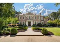 Brick house with landscaped yard and walkway at 3560 Ridgewood Nw Rd, Atlanta, GA 30327
