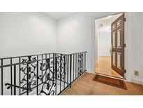 Elegant entryway with ornate railing and view of hardwood floors at 1261 Lavista Rd # F-3, Atlanta, GA 30324