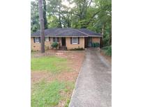 House exterior with driveway and landscaping at 2164 Mark Trl, Decatur, GA 30032