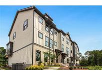 Modern townhome community with landscaped grounds at 1096 Battery Park Rd, Decatur, GA 30033