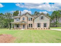 Two story home with brick and siding exterior at 25 Homesite Cooper E Cv, Fayetteville, GA 30215