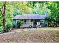 Charming ranch home with front porch and landscaped yard at 4618 Stewart Reilly Nw Dr, Acworth, GA 30101