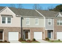 Three townhouses with attached garages at 630 Jervis Way, Locust Grove, GA 30248