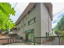 Tan brick building with balconies at 3046 Briarcliff Ne Rd # 15, Atlanta, GA 30329