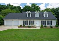 Beautiful Ranch home with 2 car garage and manicured lawn at 1870 Rocksram Dr, Buford, GA 30519