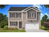 Two-story home with gray siding, brick accents, and a two-car garage at 8599 Seabiscuit Rd, Lithonia, GA 30058