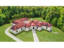 Luxury home with red roof and large yard at 2000 Enon Sw Rd, Atlanta, GA 30331