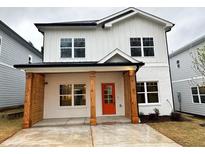 Two-story house with modern farmhouse exterior at 1985 Saint Johns Sw Pl, Atlanta, GA 30315