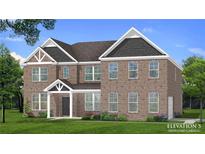 Two-story brick home with side-load garage and landscaping at 201 Haverling Pass, Hampton, GA 30252