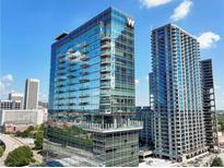 Aerial view of modern high-rise building and city skyline at 45 Ivan Allen Jr Nw Blvd # 2306, Atlanta, GA 30308