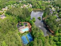 Community pool, tennis courts, clubhouse, and a lake at 2318 Starr Lake Nw Dr, Acworth, GA 30101