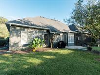 Gray house exterior with screened porch and backyard at 500 Chestnut Walk, Canton, GA 30114