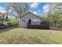 Charming bungalow with a wooden deck at 15 Johnson Nw Rd, Atlanta, GA 30318