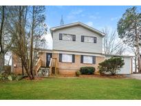 Two story home with brick and siding exterior at 3814 N Camp Creek Sw Pkwy, Atlanta, GA 30331