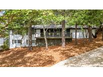 Charming ranch home with a newly renovated deck and landscaping at 2228 Old Dallas Sw Rd, Marietta, GA 30064