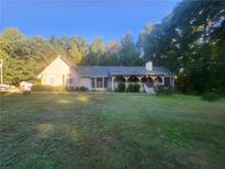 Ranch house with covered porch at 1720 Mount Carmel Rd, Mcdonough, GA 30253