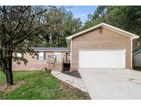 Ranch home with attached garage and landscaping at 4111 Wrexham Dr, Snellville, GA 30039