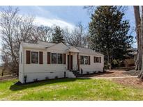 Charming ranch home with white siding, brown shutters, and manicured lawn at 3723 Debelle St, Clarkston, GA 30021