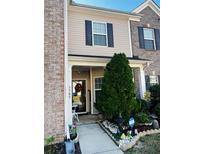 Inviting brick front exterior with landscaping and walkway at 2555 Flat Shoals Rd Apt # 3305, College Park, GA 30349