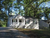 Charming one-story house with gray siding and porch at 890 Mcwilliams Se Rd, Atlanta, GA 30315
