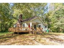 Charming house exterior with wooden deck at 2130 Perkerson Mill Rd, Austell, GA 30106