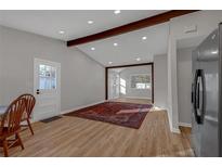 Open living area with hardwood floors and a large rug at 369 Bell Se St, Marietta, GA 30060