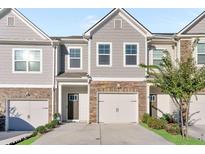 Two-story townhome with two-car garage at 1958 Dillon Dr, Lithonia, GA 30058