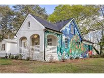 Charming renovated home with unique mural at 1696 Emerald Sw Ave, Atlanta, GA 30310