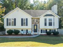 Charming one-story house with a landscaped yard at 304 Ridge Hill Cir, Canton, GA 30115