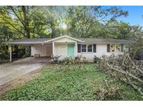 Charming ranch home with covered carport and mature trees at 2210 Rhinehill Se Rd, Atlanta, GA 30315