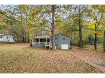 Ranch home with a front porch and attached garage at 159 S Forty W Pass, Hiram, GA 30141