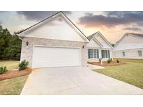 Brick ranch home with attached garage at 960 Park Place St, Social Circle, GA 30025