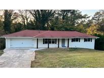 Newly renovated ranch home with a red roof at 2534 Creekview Sw Dr, Marietta, GA 30008