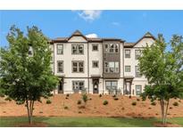 Exterior view of modern townhomes with landscaping at 1090 Battery Park Rd, Decatur, GA 30033